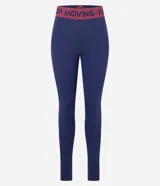 Legging deportiva de microfibra color lila, con cintura elástica ancha en contraste que presenta el texto Keep Mooving estampado.