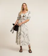 Vestido midi de viscosa y lino con estampado de hojas, escote corazón, mangas cortas abullonadas y recortes cut-out.