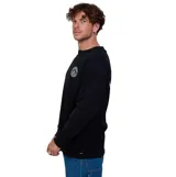 Remera de manga larga Volcom color negro, con cuello redondo y logo circular de la marca estampado en el pecho.