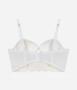 Soutien alargado color piel, confeccionado en encaje floral, con copa hueca y aro, tirantes ajustables y cierre trasero.