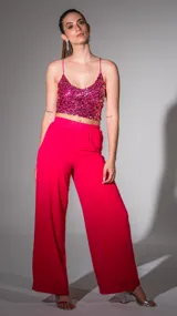 Pantalón palazzo fucsia de gasa con cintura elastizada.