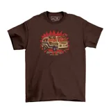 Remera de algodón color marrón con estampa frontal de una camioneta tipo combi en llamas y la frase 'Burn it all since 2009'.