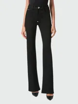 Pantalones acampanados de mezclilla negra Philipp Plein con cierre de botón dorado.