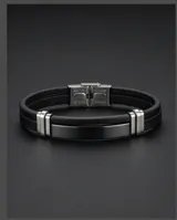 Pulsera de diseño moderno compuesta por una banda doble de cuerina negra y una chapa central de acero galvanizado con detalles metálicos en los extremos.