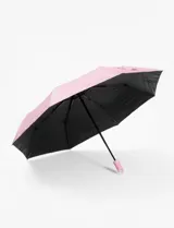 Paraguas liso color lila, con apertura y cierre automático y mango con detalle de carita sonriente.