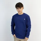 Buzo azul de algodón texturizado con logo bordado en el pecho.