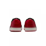Championes Nike Air Jordan 1 Retro Low, modelo Banned, con diseño en color negro y detalles en rojo, perfil bajo y suela de goma.