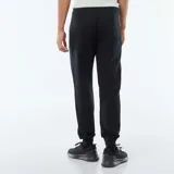 Pantalón de chándal negro, corte ajustado, con bolsillos laterales con cierre.
