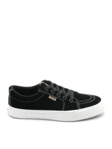 Championes urbanos de lona color negro con costuras blancas contrastantes, suela de goma blanca y cordones negros. Presenta una pequeña etiqueta con logo en el lateral.
