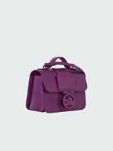 Bandolera Longchamp modelo Box-Trot XS, color morado, con correa fina al hombro y logo circular en el frente.