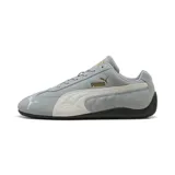 Championes Puma Speedcat OG, color gris con detalles en blanco y dorado.