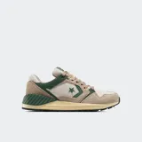 Championes Converse Wave Trainer Peak Style color beige y verde, con capellada de malla y gamuza, amortiguación de espuma CX y mediasuela viscoelástica.