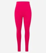 Calza deportiva larga de microfibra color fucsia, con cintura alta y bolsillo lateral.