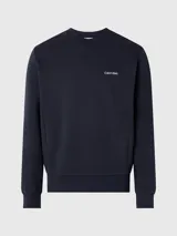 Buzo azul marino de algodón y poliéster con cuello redondo, puños y bajo acanalados. Presenta el logo de Calvin Klein bordado en pequeño en el pecho.
