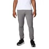 Pantalón técnico de senderismo color gris, con ajuste ergonómico, bolsillos con cierre y puños ajustables. Cuenta con tecnología de protección solar y repelencia a la humedad.