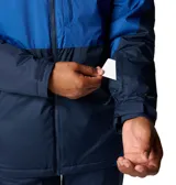 Campera técnica de esquí Columbia con tecnología Omni-Tech impermeable y forro térmico Omni-Heat. Presenta un diseño bicolor en tonos azul, con capucha ajustable, cierre frontal con solapa, bolsillos con cremallera y puños ajustables.