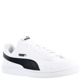 Championes urbanos Puma modelo Up, color blanco con el icónico formstrip de la marca en color negro en los laterales. Presentan un diseño de corte bajo con cierre de cordones y suela de goma resistente.