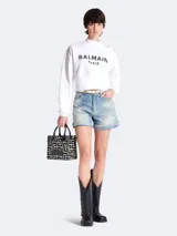Bolso tote Balmain con monograma B-Army en jacquard blanco y negro, con aplique de cuero con el logo de la marca y asas de mano de cuero.