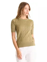 Buzo tejido de punto con diseño de ochos, cuello redondo y manga corta. Presenta terminaciones acanaladas en cuello, mangas y ruedo.