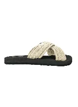 Ojotas O'Neill con base negra y capellada de tiras cruzadas confeccionadas en cuerda trenzada de color beige.