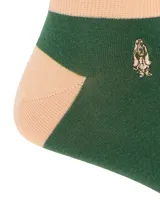 Medias cortas Hush Puppies color verde con detalles en beige en el talón, puntera y puño. Presentan el logo de la marca bordado en el lateral.