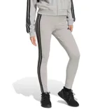 Calza deportiva Adidas Essentials, color gris melange con las icónicas tres tiras laterales en negro y logo de la marca estampado en el muslo.