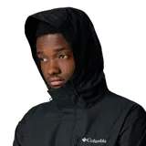 Campera impermeable Columbia Hikebound II de color negro, con capucha ajustable, cierre frontal y bolsillos con cremallera. Incluye el logo de la marca bordado en el pecho.