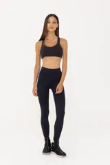 Calza larga negra de compresión media, cintura alta y largo estándar.