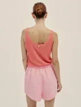 Musculosa tejida color salmón.