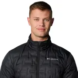 Campera puffer Columbia modelo Delta Ridge II Down Heat Seal, de color negro con diseño acolchado termosellado y cierre frontal. Cuenta con tecnología Omni-Heat™ y relleno de plumón.