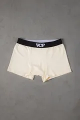Boxer anatómico color crema con cintura elástica negra que presenta el logo VCP en blanco.