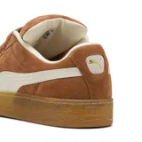 Championes Puma Suede XL color marrón caramelo con detalles en blanco.