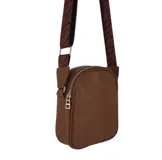 Bandolera marrón de cuero tipo floutter con doble cierre superior y correa de algodón regulable con estampado de cebra.