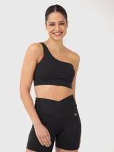 Top deportivo de un solo hombro, color negro, con diseño de soporte medio y almohadillas removibles.