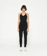 Musculosa blanca de algodón orgánico con tirantes finos cruzados de lurex plateado en la espalda.