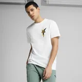 Remera Puma Road to Unity Gráfica, color blanco con cuello redondo, manga corta y estampa frontal en el pecho con diseño de estrella negra y tipografía amarilla.