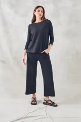 Sweater blanco de algodón y poliéster, de corte holgado y manga 3/4.