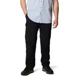 Pantalon convertible para hombre, color negro, diseñado para senderismo. Cuenta con cremalleras en las rodillas que permiten transformar la prenda en shorts, bolsillos cargo laterales, bolsillos de seguridad con cierre y cinturón integrado. Fabricado con tecnología de secado rápido y protección solar.