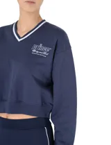 Buzo corto azul marino de algodón con cuello en V y logo de Prince bordado en blanco.