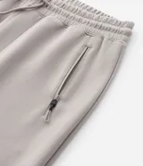 Pantalón jogger deportivo de hombre en color azul, con cintura elástica ajustable con cordón, bolsillos laterales con cierre de cremallera y bajo ajustado con puño elastizado.