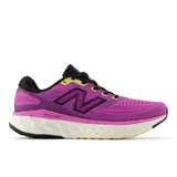 Championes de running New Balance Fresh Foam X Evoz V4 para mujer, color lila con detalles en amarillo y negro.