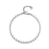 Tobillera elástica plateada con fornitura de bolas.