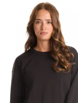 Buzo de modal color negro, con cuello redondo y mangas largas abullonadas con puños elásticos.