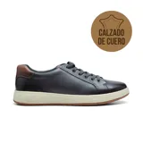Zapato casual Hi-Tec Jey de cuero negro con detalles en marrón en el talón y cordones grises.