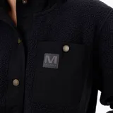 Campera polar sherpa de mujer en color negro, con cuello alto, cierre de botones a presión, bolsillos frontales con refuerzo en nylon y parche con logo de la marca en el pecho.
