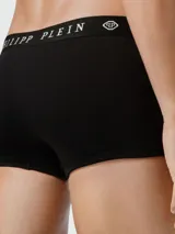 Bóxer blanco de algodón con pretina elástica negra con el logo de Philipp Plein en blanco y diseño de calavera en la pierna derecha.