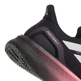 Championes de running Adidas modelo Pure Boost 5, con parte superior de malla técnica negra y mediasuela con tecnología de amortiguación degradada en tonos amarillo, naranja y violeta. Presentan las icónicas tres bandas laterales en color plateado y suela Adiwear de alta tracción.