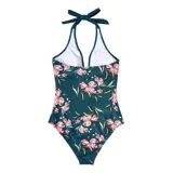Malla entera de color verde oscuro, combinada con un diseño floreado en la parte inferior. Presenta escote halter cruzado y fruncidos en la zona del abdomen.