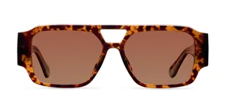Lentes de sol con diseño oversized de estilo aviador, con armazón flat-top de carey y doble puente. Presentan lentes tintadas en tono marrón y patillas anchas.