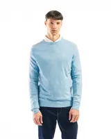 Buzo de punto color verde claro, con cuello redondo y mangas largas.